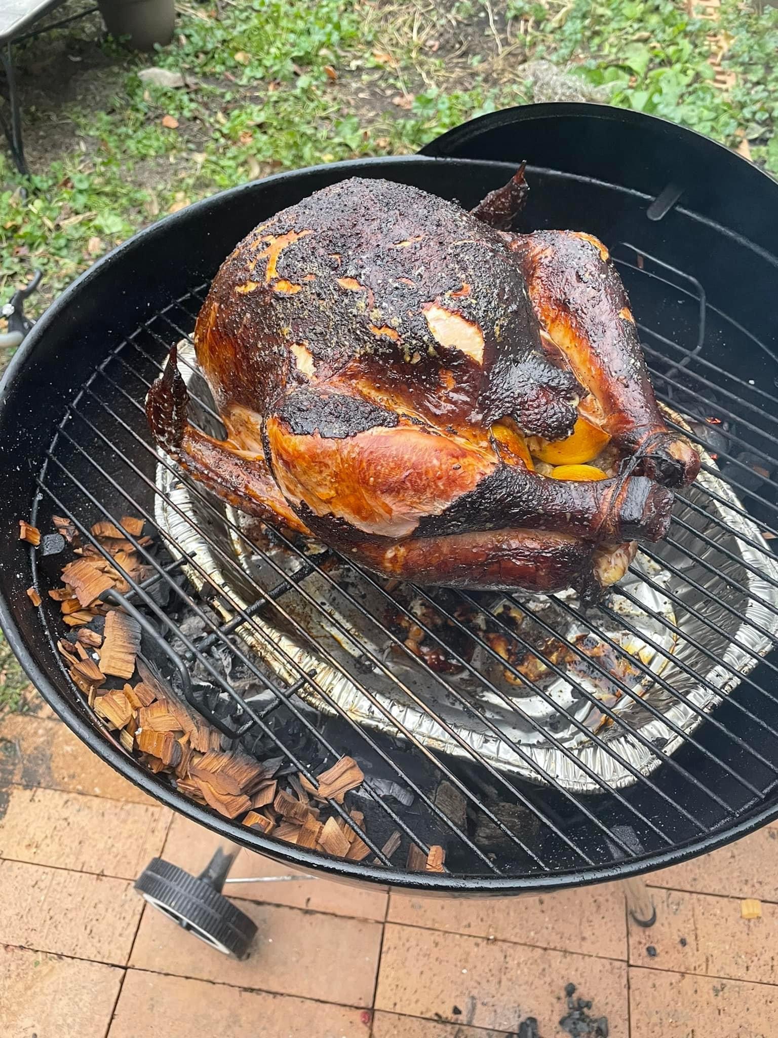 Turkey cooking on a grill